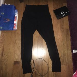 Black pair of Lulu Lemons with sheer calf & thigh.